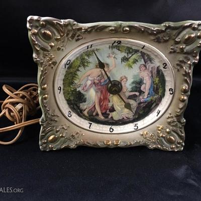 Antique hand painted porcelain clock (repaired corner)