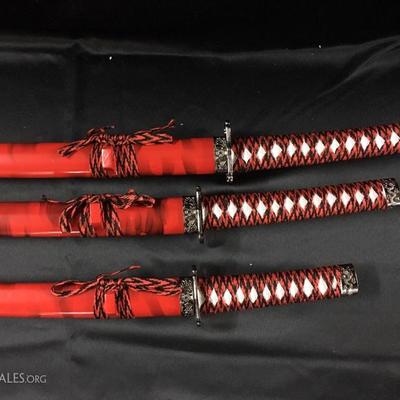 Samarai swords with black holder