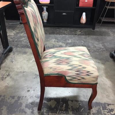 Rolling upholstered chair