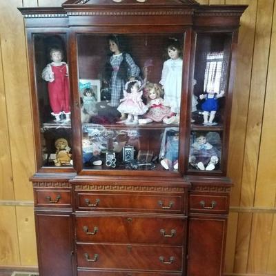 Nice china/secretary cabinet with collectible dolls. ALL 50% OFF