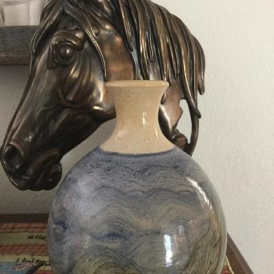 Horse sculpture and pottery vase