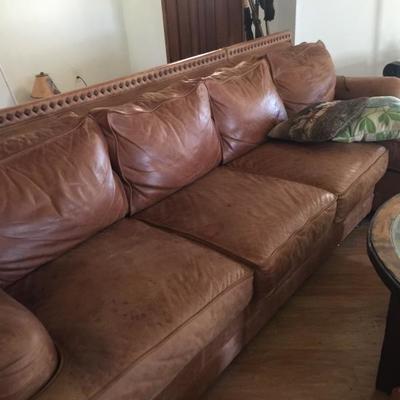 4 seat leather couch with recliner at end ! High end leather but it does need cleaning on parts of seats - 
You could lay a blanket down...