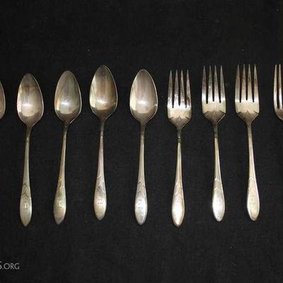 Eleven Pieces Assorted Heirloom Silver Plated Flatware