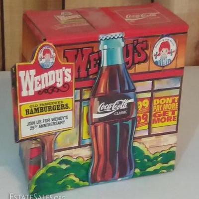 Coca-Cola commemorative bottles for Wendy's 25th anniversay. In original box. Includes commemorative