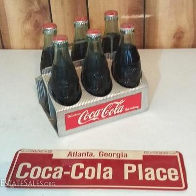 Vintage metal Coca-Cola Sixpack, including commemorative bottles printed in original old style class