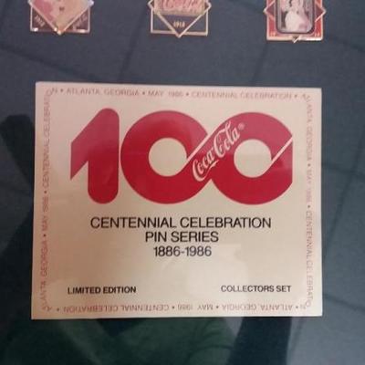 Coca-Cola collector's pins commemorating Coca-Cola's 100th anniversary. Came from Employee Store.