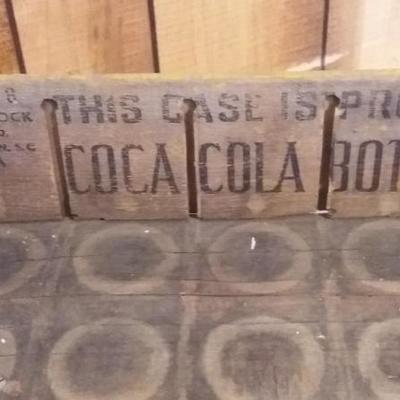 Vintage Coca-Cola wagon with wooden wheels. Crate from Woodstock Mfg. Co., Charleston, SC.
