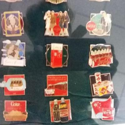 Coca-Cola collector's pins commemorating Coca-Cola's 100th anniversary. Came from Employee Store.