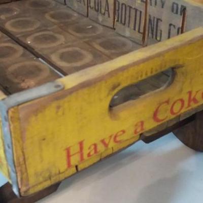 Vintage Coca-Cola wagon with wooden wheels. Crate from Woodstock Mfg. Co., Charleston, SC.