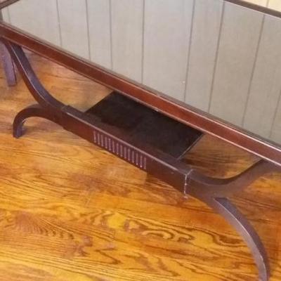 One vintage mahogany coffee table with glass insert top, decorative bowed legs; and one vintage side