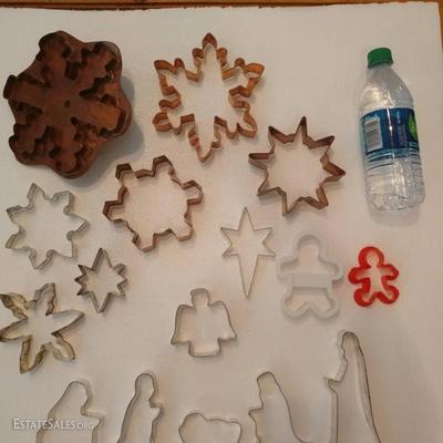 Snowflakes and nativity scene:  Random Cookie Cutters priced 25 cents for plastic, .50 small tin cutters, $5 - $10 dollars for Copper...