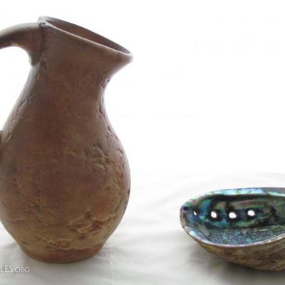 Pottery Pitcher shown with an Abalone Shell