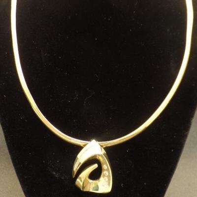 14 Karat Yellow Gold Diamond Pendant, containing approx 1 twc diamonds. $2,500