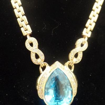 Yellow Gold, Topaz and Diamond necklace. $2,500
