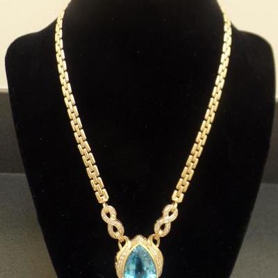 Yellow Gold, Topaz and Diamond necklace. $2,500