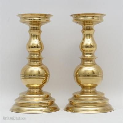 A matched pair of Brass Baluster Form Candlesticks. Purchased at Golden and Associates Antiques, King Street, Charleston, SC. Each...
