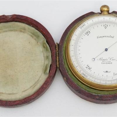 Late 19th c. Short & Mason LTD, London English Compensated Pocket Brass Cased Barometer. The barometer comes in the original green silk...