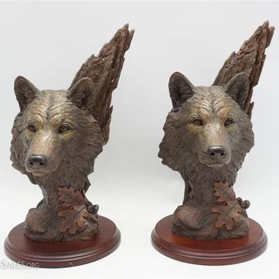 Pair of Limited edition wolf sculptures by artist Tim Wolfe. Cast in crushed alabaster resin from the original clay sculpture by Tim....