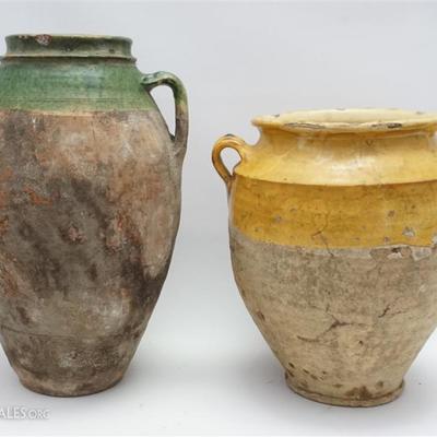 Pair of Antique French Pottery Confit / Olive Jars. One in yellow glaze, the other green. Used to store olive oils and olive. Age...