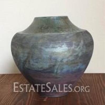 
060: Christopher Mathie Small Urn 
Christopher Mathie small Raku urn, 1998, iridescent colors on top of urn, measures 9 H x 10 W x 10 D...