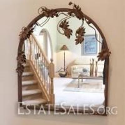 
066: Huge Grape Vine Mirror 
Gorgeous hand wrought metal mirror with grape leaves and vines running across the top and sides, made by...