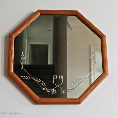 Antique etched glass mirror in custom frame.