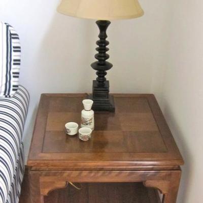 Pair of Ethan Allen Asian motif side tables in pecan.