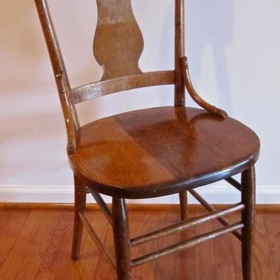 Antique oak fiddle back side chair - round style.
