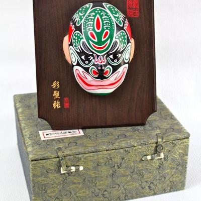 Miniature Chinese opera mask, mounted on wood for table top or wall mounted display, and presentation box