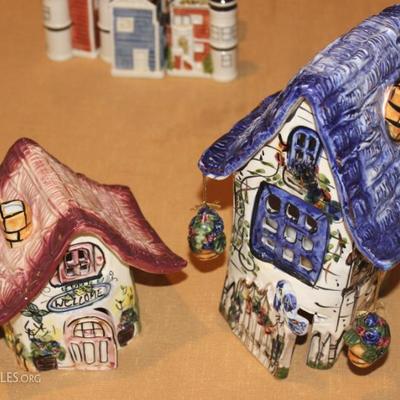 Two porcelain decorative houses, tallest one is 9