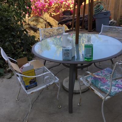 Mid Century 4 Mesh Iron chairs....  patio table seperately priced 