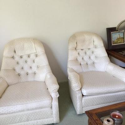 Upholstered white chairs 