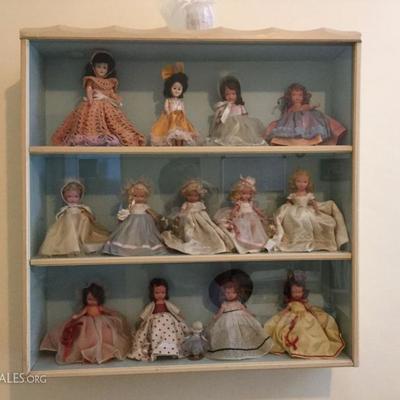 Story book dolls in case