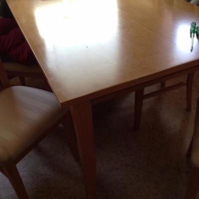 lovely table with 5 wooden chairs