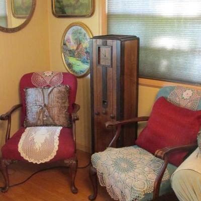 Grandfather Clock Radio flanked by chairs