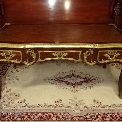 ROCOCO STYLE DESK WITH GILT BRONZE MOUNTS AND LEATHER TOP