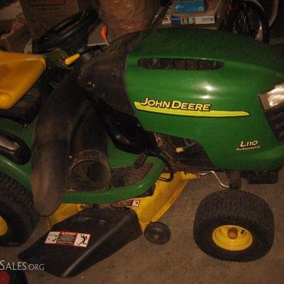 John Deer Tractor with many accessories. Low hours. 