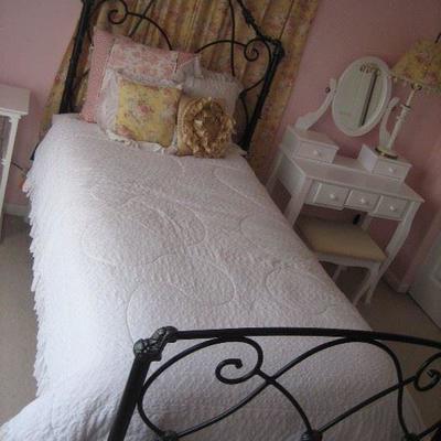 Twin size iron bed with mattress. Perfect for a young girls room or guest room $195