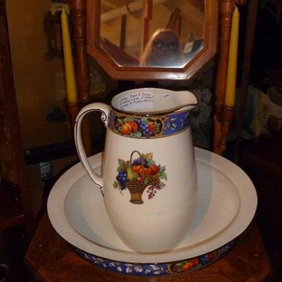 Antique porcelain wash pitcher and bowl.