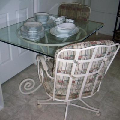Glass top table with 2 chairs