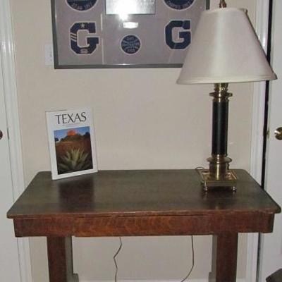 Antique Empire Tiger Oak Library Table with Center Drawer, Goliad Framed Football Photo and Letters, etc. and Brass/Black Column Lamp 