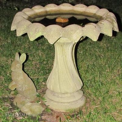 Vintage Cement Flower Petal Twisted Column Bird Bath (32"D x 31"H) shown with a Cement Rabbit Figurine