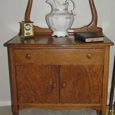 Antique Oak Wash Stand With Harp Towel Bar.  Also Shown is a Small Seth Thomas Clock and an Antique Water Pitcher