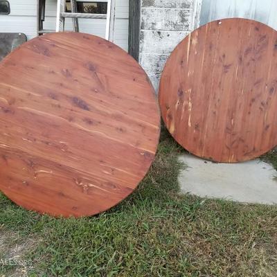 52 inch round cedar table tops.  We have 9 of them.
