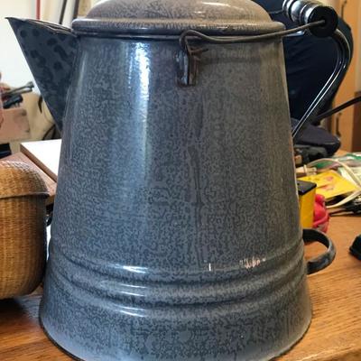 Extra large cowboy camping coffee pot - the kind you throw the grounds in and boil the water
