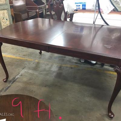 9ft. Duncan Phyfe style table with 3 leaves and table pads