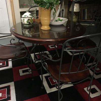 round wood and iron table $275 plus an additional 40% off 
