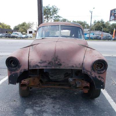 Chevrolet two door, split window coup on late model frame; most parts in trunk; no motor or transmission; bill of sale $850
