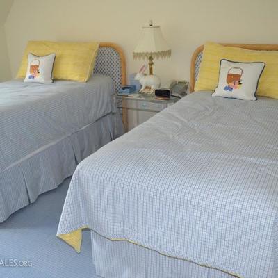 Twin beds with upholstered needlepoint headboard