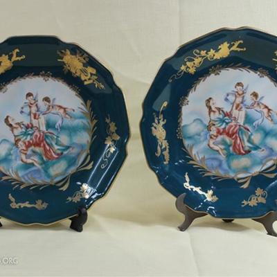 Pair of porcelain  putties chargers, 2